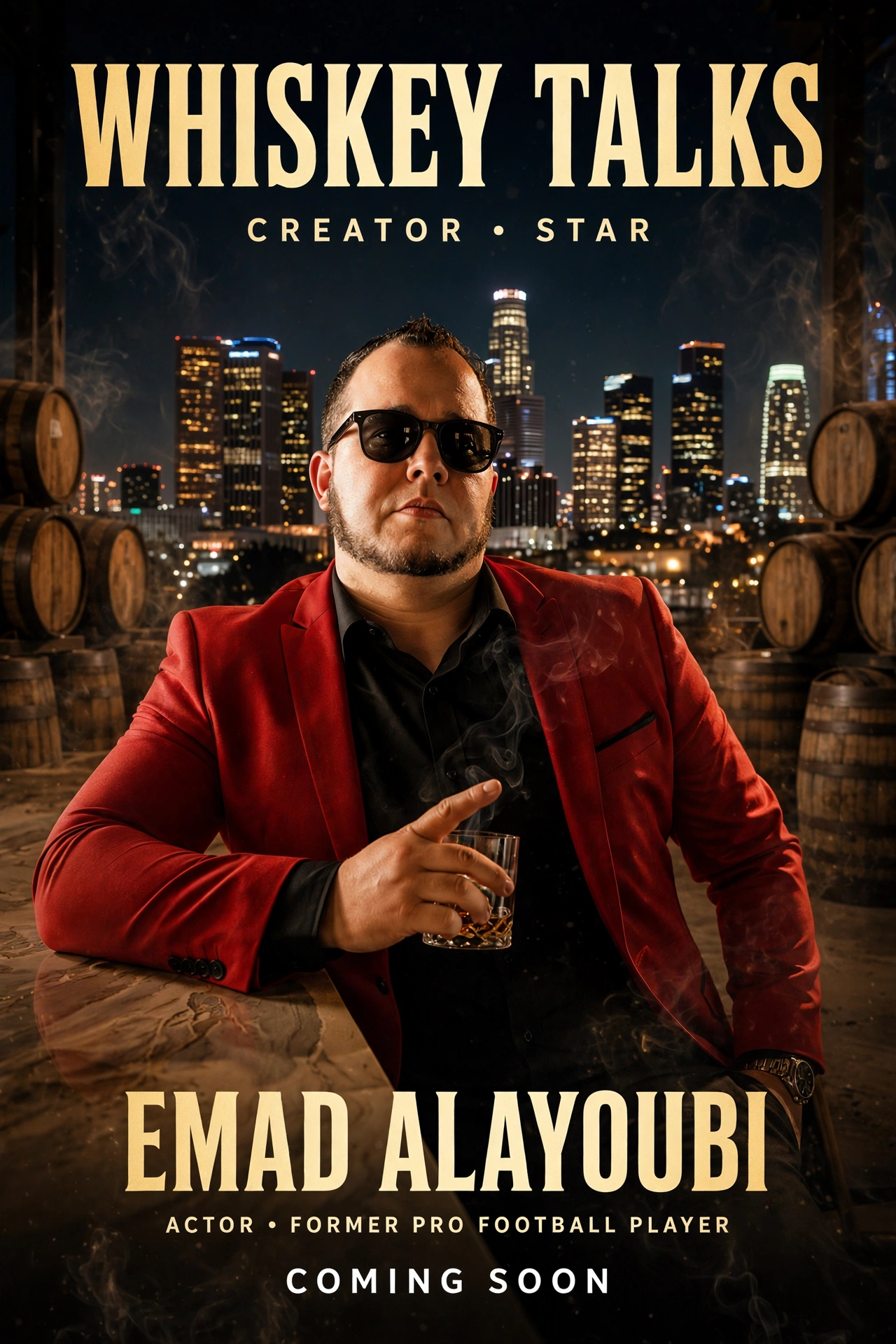 Emad Alayoubi in a red blazer with a whiskey glass, Los Angeles skyline behind him